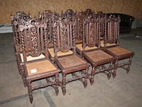 12 antieke eetkamerstoelen met rotan zitting en houtsnijwerk. - afbeelding 1 van  2