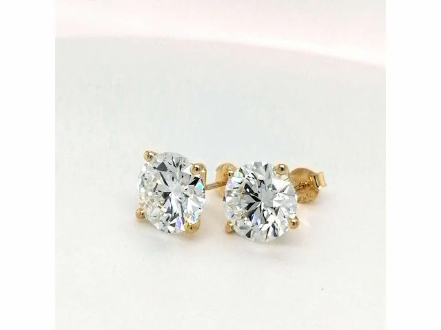 14 karaat geelgouden oorstekers met 6,07 crt. diamant. - afbeelding 2 van  6