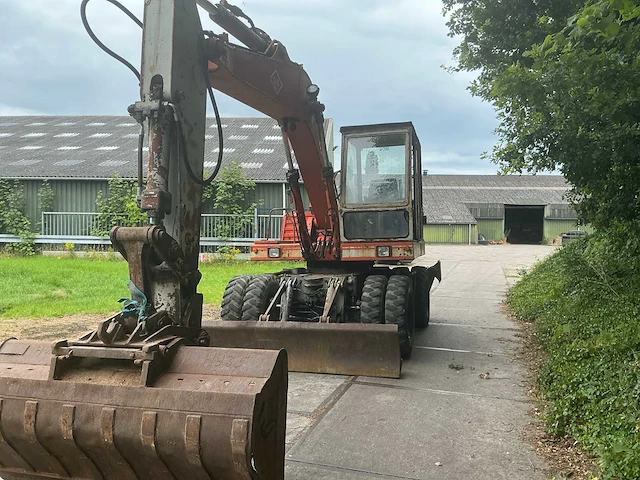 1985 o & k mh4ga2 banden graafmachine - afbeelding 1 van  45