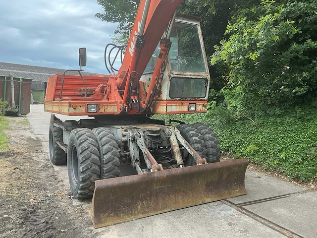 1985 o & k mh4ga2 banden graafmachine - afbeelding 33 van  45