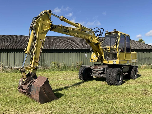 1989 atlas 1304k banden graafmachine - afbeelding 1 van  33