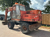 1990 atlas 1302 banden graafmachine - afbeelding 23 van  33