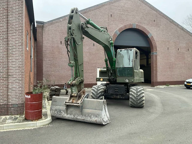 1993 o&k mh4 plus banden graafmachine - afbeelding 1 van  24
