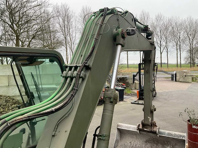 1993 o&k mh4 plus banden graafmachine - afbeelding 15 van  24