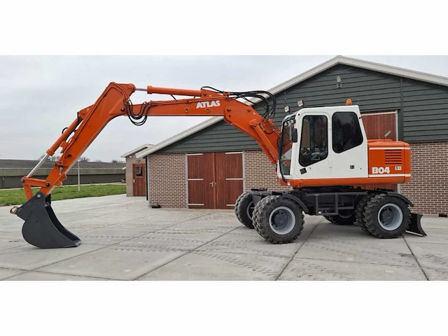 1994 atlas 1304 banden graafmachine - afbeelding 1 van  21