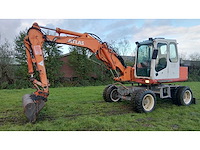 1996 atlas 1104 banden graafmachine - afbeelding 1 van  25