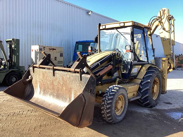 1998 caterpillar 438 c graaflaadmachine - afbeelding 1 van  25