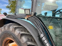 1998 new holland ts100 vierwielaangedreven landbouwtractor met bos maaiarm - afbeelding 10 van  52
