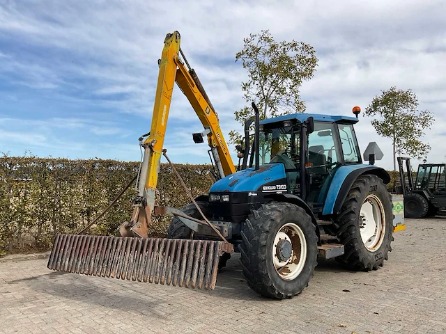 1998 new holland ts100 vierwielaangedreven landbouwtractor met bos maaiarm - afbeelding 1 van  52