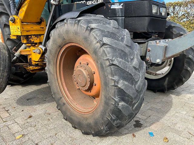 1998 new holland ts100 vierwielaangedreven landbouwtractor met bos maaiarm - afbeelding 15 van  52