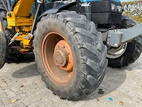 1998 new holland ts100 vierwielaangedreven landbouwtractor met bos maaiarm - afbeelding 15 van  52