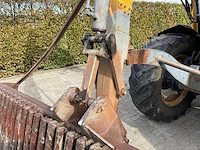 1998 new holland ts100 vierwielaangedreven landbouwtractor met bos maaiarm - afbeelding 25 van  52