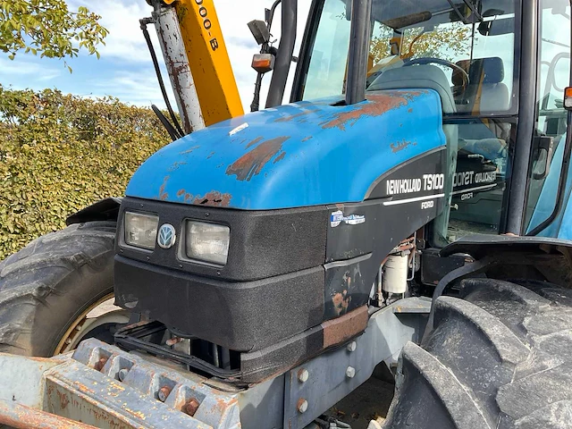 1998 new holland ts100 vierwielaangedreven landbouwtractor met bos maaiarm - afbeelding 27 van  52