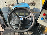 1998 new holland ts100 vierwielaangedreven landbouwtractor met bos maaiarm - afbeelding 31 van  52