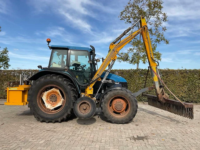 1998 new holland ts100 vierwielaangedreven landbouwtractor met bos maaiarm - afbeelding 34 van  52