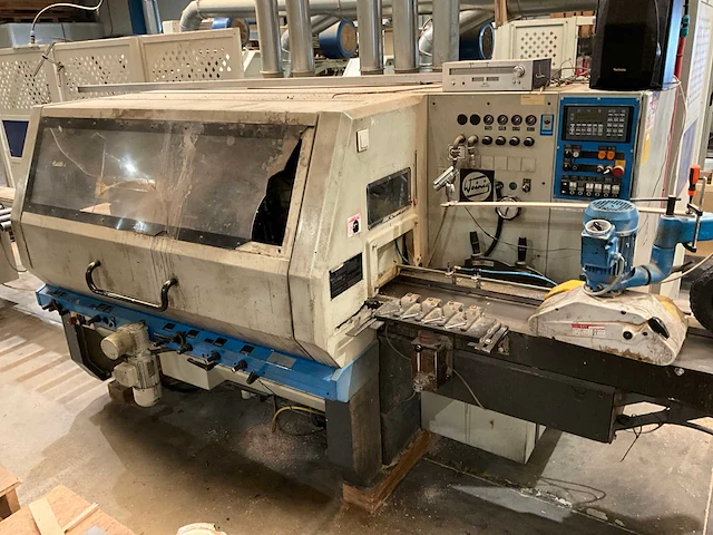 1998 weinig unimat 23e vierzijdige profileer- en schaafmachine v.v. masterwood euromec feeder - afbeelding 1 van  20