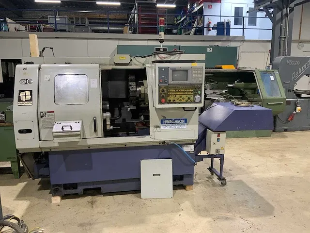 2000 hwacheon hi-tech 100a cnc draaibank - afbeelding 22 van  28