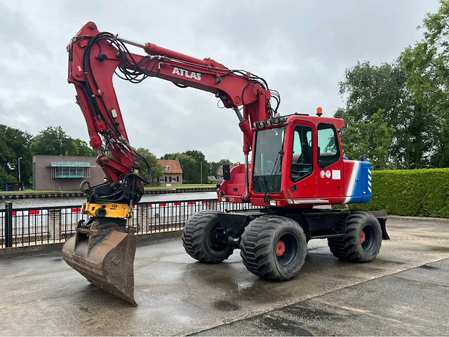 2001 atlas 1404k mobiele banden graafmachine - afbeelding 1 van  48