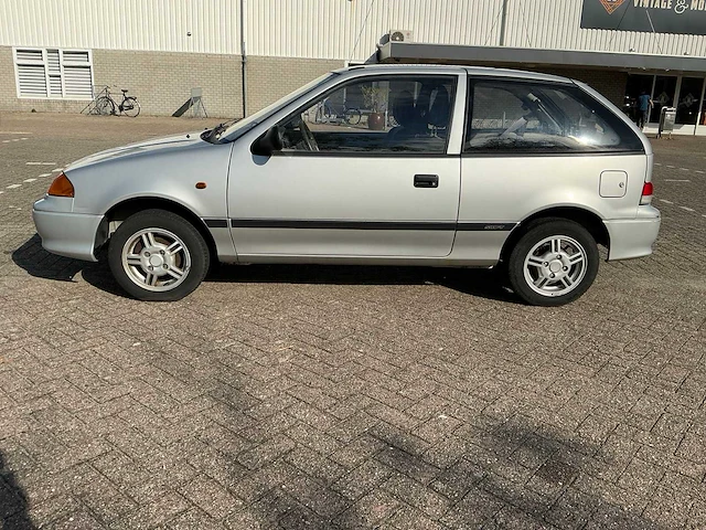 2002 suzuki swift personenauto - afbeelding 35 van  36