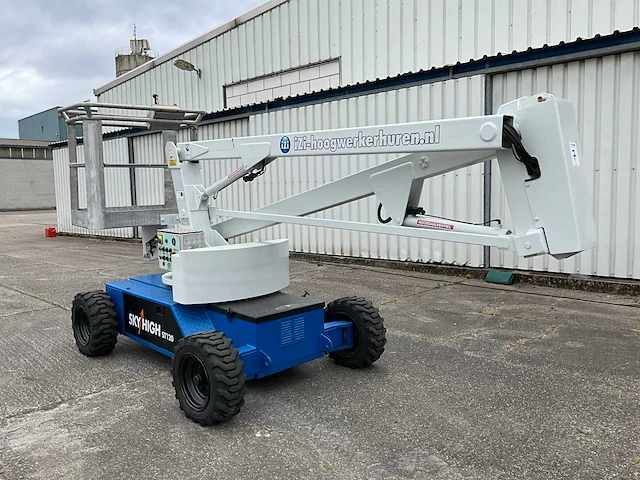 2004 skyhigh st 120 kniktelescoop hoogwerker - afbeelding 1 van  20