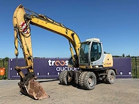 2005 new holland mh plus banden graafmachine