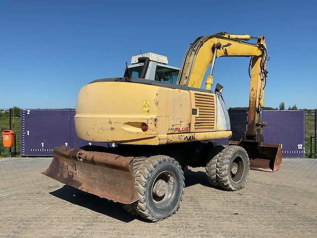 2005 new holland mh plus banden graafmachine - afbeelding 12 van  18
