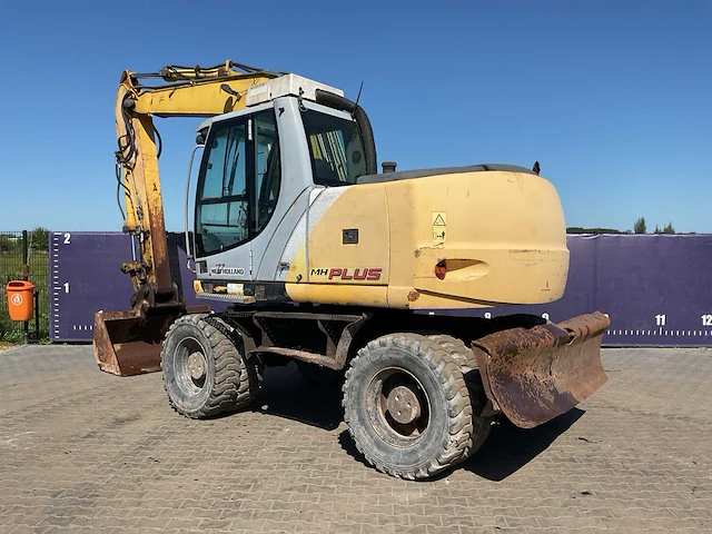 2005 new holland mh plus banden graafmachine - afbeelding 13 van  18