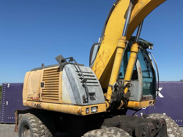 2005 new holland mh plus banden graafmachine - afbeelding 15 van  18