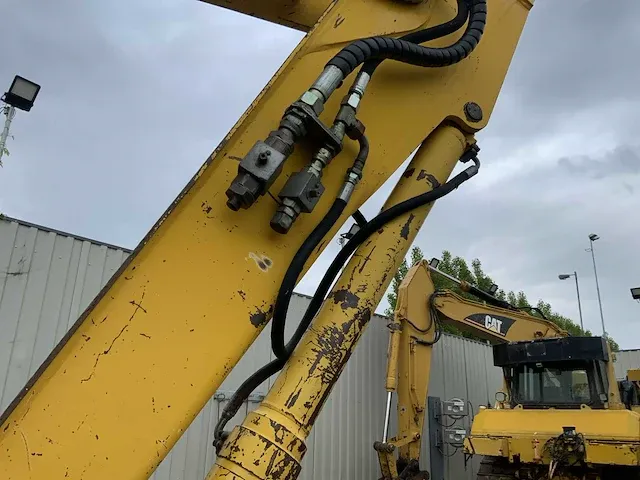 2006 komatsu pw110 banden graafmachine - afbeelding 6 van  34