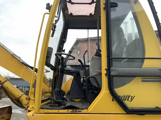 2006 komatsu pw110 banden graafmachine - afbeelding 8 van  34