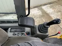 2006 komatsu pw110 banden graafmachine - afbeelding 14 van  34