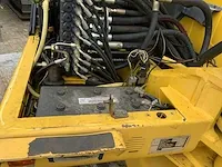 2006 komatsu pw110 banden graafmachine - afbeelding 22 van  34