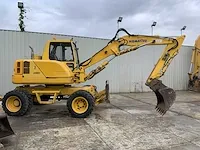 2006 komatsu pw110 banden graafmachine - afbeelding 12 van  34