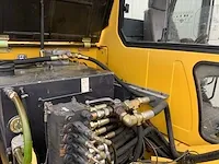 2006 komatsu pw110 banden graafmachine - afbeelding 24 van  34