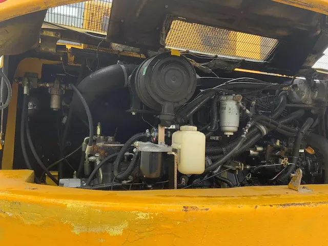 2006 komatsu pw110 banden graafmachine - afbeelding 25 van  34