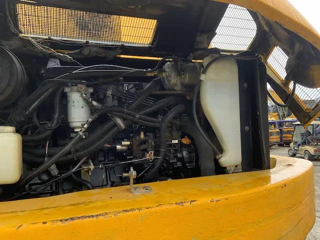 2006 komatsu pw110 banden graafmachine - afbeelding 26 van  34