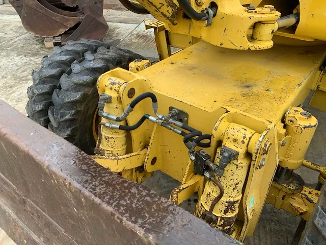 2006 komatsu pw110 banden graafmachine - afbeelding 34 van  34