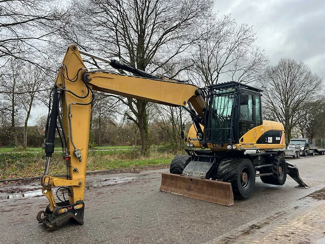 2007 caterpillar m316d banden graafmachine - afbeelding 1 van  21