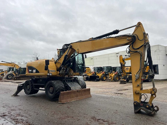 2007 caterpillar m316d banden graafmachine - afbeelding 15 van  21