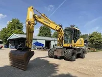 2007 komatsu pw140-7 banden graafmachine