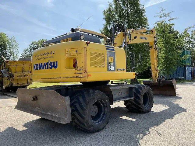 2007 komatsu pw140-7 banden graafmachine - afbeelding 23 van  35