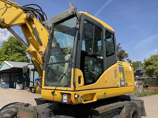 2007 komatsu pw140-7 banden graafmachine - afbeelding 31 van  35