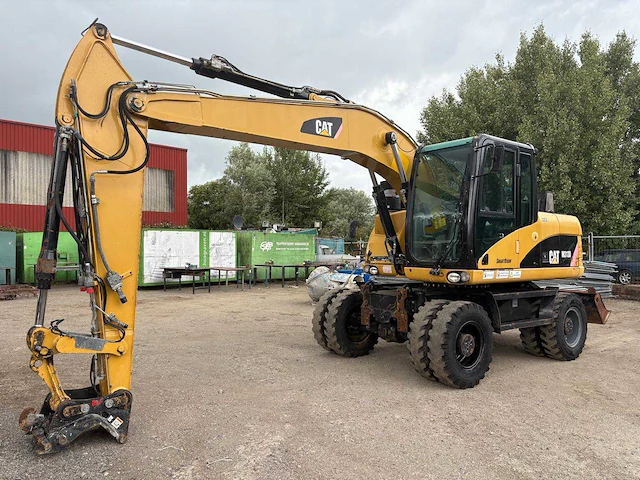 2008 caterpillar m313d rupsgraafmachine - afbeelding 1 van  36