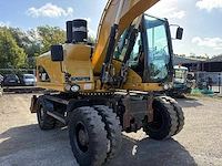 2008 caterpillar m313d rupsgraafmachine - afbeelding 32 van  36