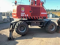 2008 new holland mh 5.6 banden graafmachine - afbeelding 39 van  43