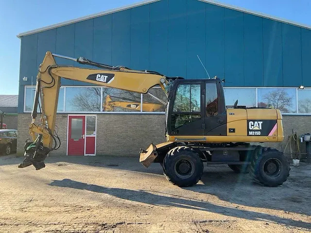 2010 caterpillar m315d banden graafmachine, (txf-81-z) - afbeelding 23 van  27