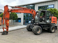 2010 hitachi zx140w-3 banden graafmachine - afbeelding 1 van  48
