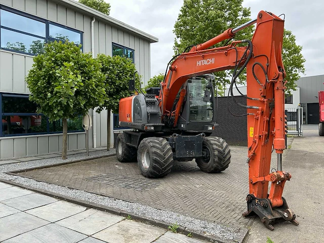 2010 hitachi zx140w-3 banden graafmachine - afbeelding 23 van  48