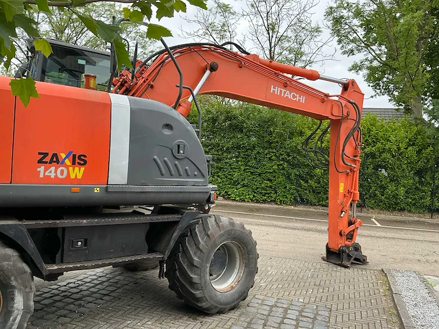 2010 hitachi zx140w-3 banden graafmachine - afbeelding 44 van  48