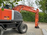 2010 hitachi zx140w-3 banden graafmachine - afbeelding 44 van  48